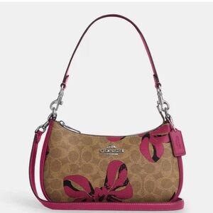 Coach Teri Shoulder Bag in Signature Canvas with ribbons, bows in Tan/Pink Multi